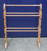 A modern towel rail. 61.5 cm wide.