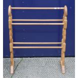 A modern towel rail. 61.5 cm wide.