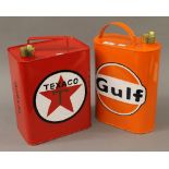 Two oil cans. The largest 33 cm high.