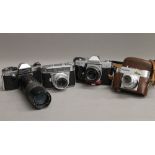 A collection of vintage cameras, including Voigtlander, etc.
