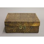 An early 20th century snake skin vanity case. 20.5 cm wide.