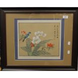 A Chinese painting on silk, Birds Amongst Flowers, framed and glazed. 32 x 29.5 cm.