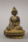 A bronze model of buddha. 14 cm high.