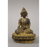 A bronze model of buddha. 14 cm high.