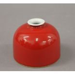 A red beehive porcelain brush pot. 7.5 cm high.