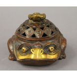 A Chinese bronze frog censer. 10 cm high.