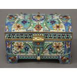 An enamel and cabochon decorated silver gilt casket, bearing Russian marks. 12 cm wide. 16.