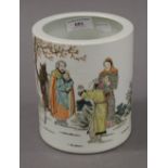 A Chinese porcelain brush pot decorated with figures. 15 cm high.