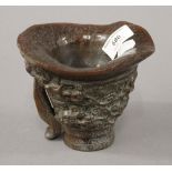 A libation cup. 12 cm high.