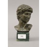 A bronze male bust on plinth base. 17 cm high.