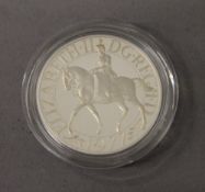 A silver proof crown