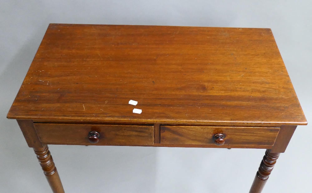 A Victorian mahogany two drawer side table. 86 cm wide, 47.5 cm deep, 76.5 cm high. - Image 2 of 5