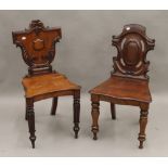 Two 19th century mahogany hall chairs. The largest 47 cm wide.