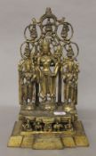 A gilt bronze three God figure. 28 cm high.