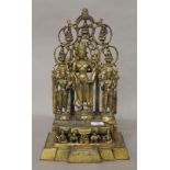 A gilt bronze three God figure. 28 cm high.