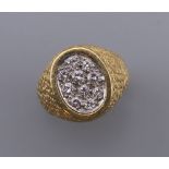 A Kutchinsky 18 ct gold and diamond ring,