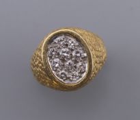 A Kutchinsky 18 ct gold and diamond ring,