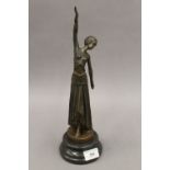 An Art Deco style bronze figurine. 34 cm high.