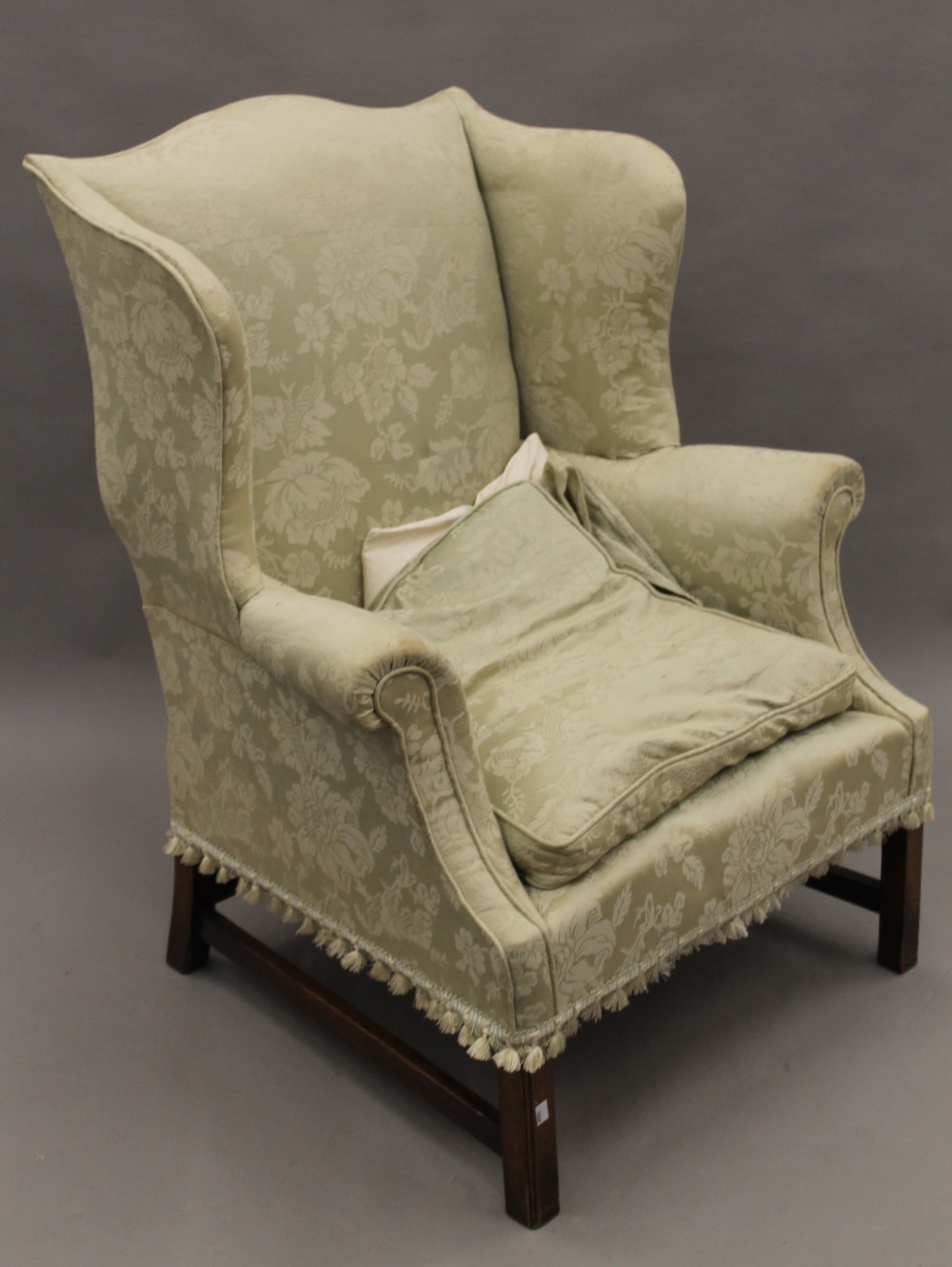 An early 20th century upholstered wing back armchair. 80 cm wide. - Image 6 of 8