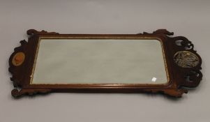 A 19th century inlaid mahogany wall glass. 106 cm high.