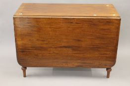 A Victorian mahogany drop leaf table. 106 cm wide.