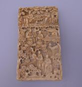 A 19th century Canton carved ivory card case. 8.25 cm high.