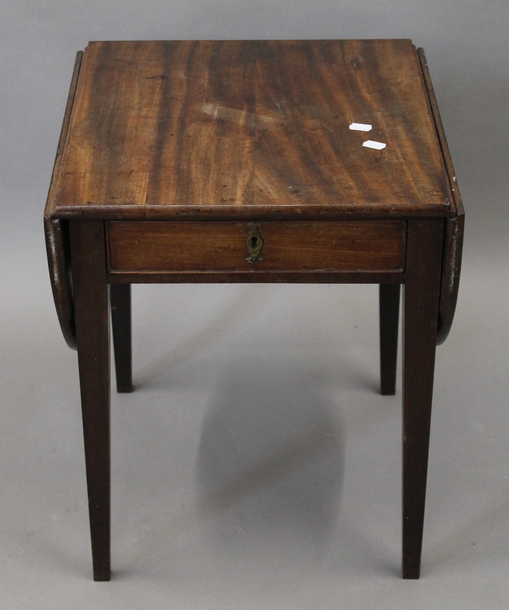 A small 19th century mahogany Pembroke table. 53.5 cm high.