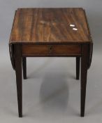 A small 19th century mahogany Pembroke table. 53.5 cm high.