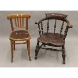 A 19th century smokers bow armchair and a bentwood chair. The former 63 cm wide.