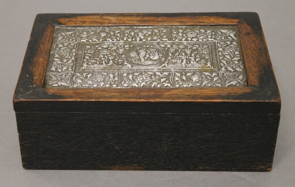 An Eastern wooden and silver box. 15.5 cm wide.
