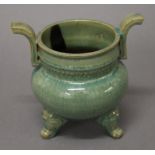 A Chinese green pottery censer. 16 cm high.