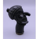 A Victorian pipe tamper formed as Mr Punch. 6.5 cm high.