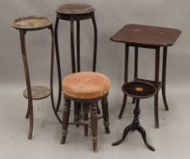 A Victorian piano stool, two torcheres and two side tables. The former 49 cm high.