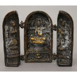 A bronze triptych. 13.5 cm high.