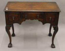 An 18th century style low boy. 91 cm wide.