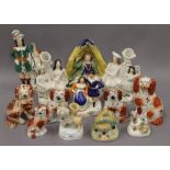 A collection of various Staffordshire figures. The largest 26 cm high.