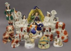 A collection of various Staffordshire figures. The largest 26 cm high.