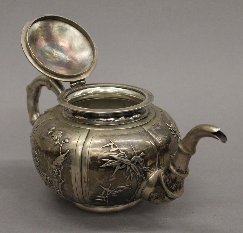 A Chinese silver three-piece tea set. The teapot 25 cm long. 30.1 troy ounces. - Image 8 of 18