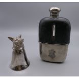A silver plated hip flask and a silver plated fox mask stirrup cup. The latter 8 cm high.