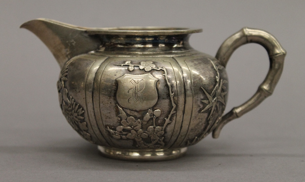 A Chinese silver three-piece tea set. The teapot 25 cm long. 30.1 troy ounces. - Image 12 of 18