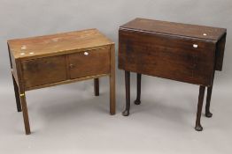 A Georgian mahogany pad foot drop leaf table and a mahogany side cupboard. The latter 70 cm wide.