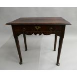 An 18th century oak single drawer side table. 76 cm wide.