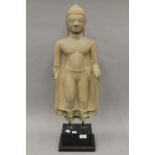 An early, possibly 15th century South East Asian stone carving of Buddha,