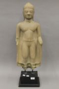 An early, possibly 15th century South East Asian stone carving of Buddha,