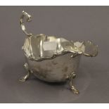 A silver sauce boat. 16.5 cm long. 6.6 troy ounces.