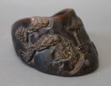 A horse's hoof carved with Chinese decoration. 7 cm high.