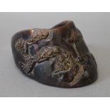 A horse's hoof carved with Chinese decoration. 7 cm high.