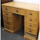 A Victorian pine pedestal desk (one drawer lacking). 104 cm wide.