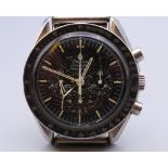 A gentleman's Omega Speedmaster Professional wristwatch, mounted on Tissot strap,