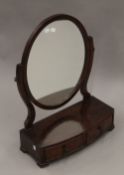 A 19th century mahogany two drawer toilet mirror. 49 cm wide.